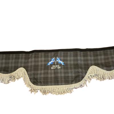 A bold truck pelmet featuring crossed Saltire flags and “Only Way Is Scottish” slogan on Grey Granite tartan, finished with classic thick white bullion trim. Whiterig Truck Curtains